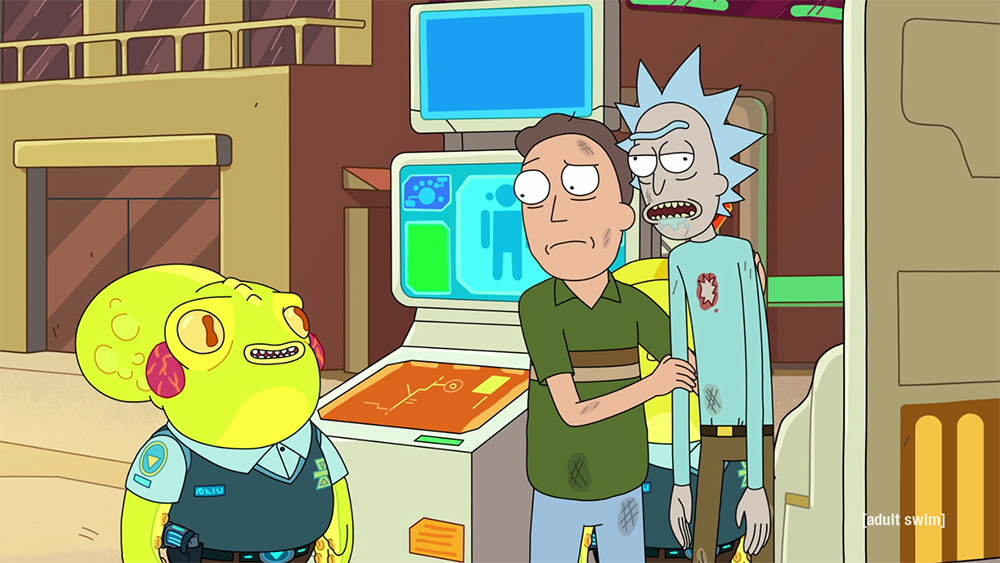Jerry is steadying Rick after losing his brain functions. A short green alien looks on.